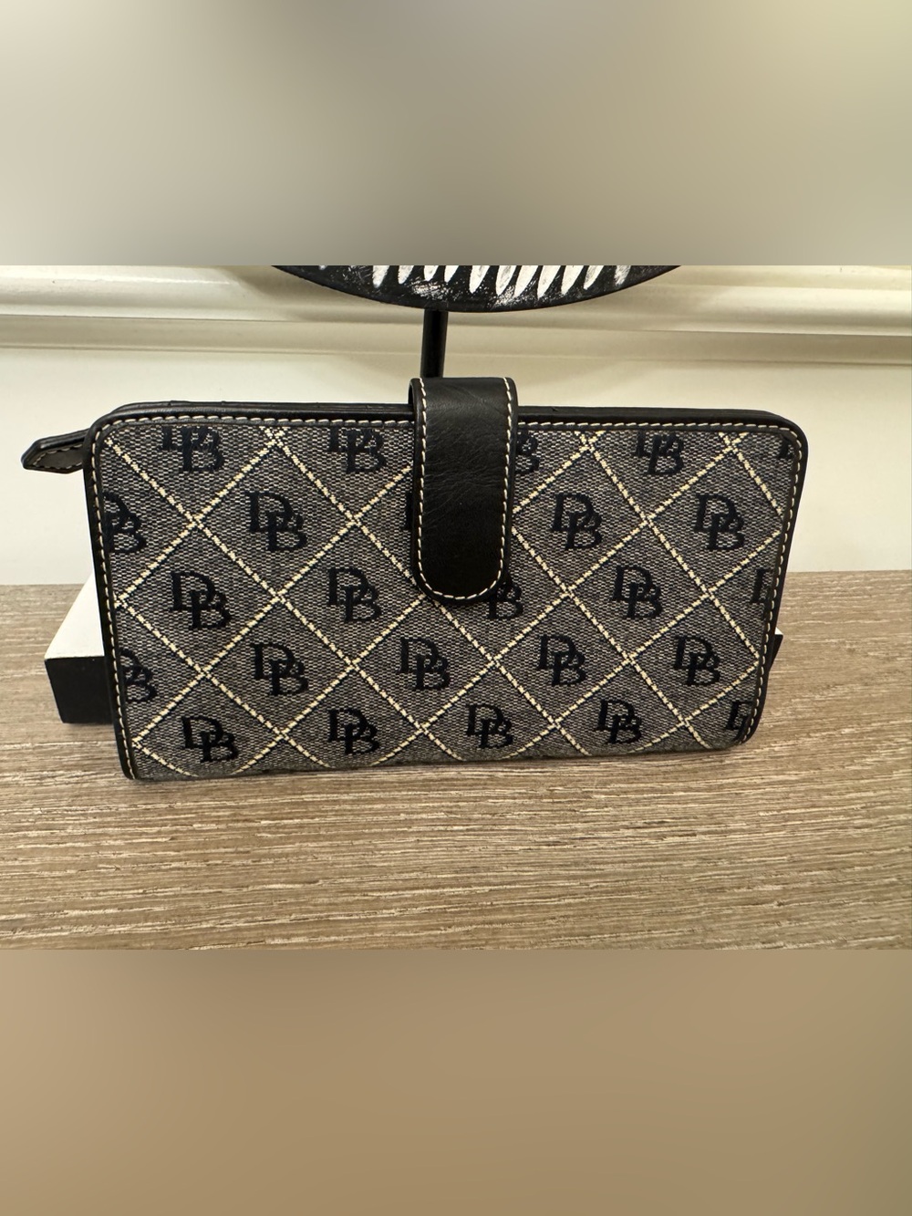 Dooney & BourkePatterned Black and  Zip Wallet